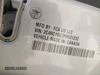 2023 Chrysler Pacifica Touring L with VIN 2C4RC1BG7PR521232, listed as a IAAI auction lot 42087909 with 34,609 mi miles and . Bid and sale history available at DreamBid. Image 9.