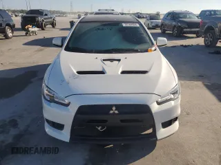 2014 Mitsubishi Lancer Evolution GSR z VIN JA32W8FV5EU023703, wystawiony jako Copart lot #72744504 z przebiegiem Nie podano mil oraz Szkody całkowita. Historia ofert i sprzedaży dostępna na DreamBid. Obrazek 5.
