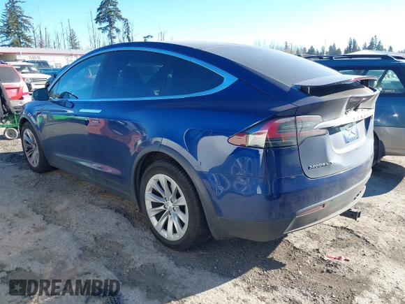 2017 Tesla Model X 90D z VIN 5YJXCBE21HF076514, wystawiony jako IAAI lot #41559020 z przebiegiem 108 573 mil mil oraz . Historia ofert i sprzedaży dostępna na DreamBid. Obrazek 3.