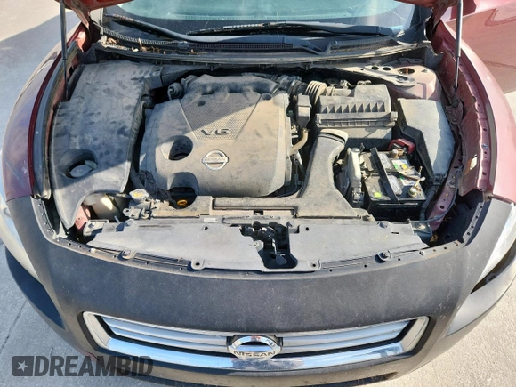 2013 Nissan Maxima S z VIN 1N4AA5AP8DC848261, wystawiony jako Copart lot #61849465 z przebiegiem 183 316 mil mil oraz Czysty tytuł • Clean title. Historia ofert i sprzedaży dostępna na DreamBid. Obrazek 11.