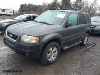 2004 Ford Escape XLT with VIN 1FMYU93134KA37307, listed as a IAAI auction lot 41514916 with 207,522 mi miles. Bid and sale history available at carsss.com. Image 2.