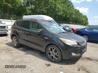 2013 Ford Escape SEL with VIN 1FMCU0HX6DUB66021, listed as a Copart auction lot 63814635 with 129,691 mi miles and Clean title. Bid and sale history available at DreamBid. Image 4.