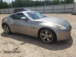 2009 Nissan 370Z Touring with VIN JN1AZ44E49M402605, listed as a Copart auction lot 55972355 with 157,066 mi miles and Clean Title. Bid and sale history available at DreamBid. Image 4.
