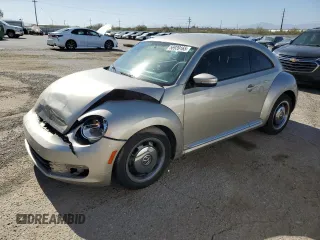 2012 Volkswagen Beetle 2.5L PZEV with VIN 3VWJP7AT4CM652295, listed as a Copart auction lot 56939165 with 117,955 mi miles and Salvage title. Bid and sale history available at DreamBid. Image 1.
