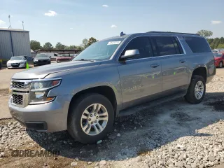 2018 Chevrolet Suburban LS with VIN 1GNSCGKC6JR354626, listed as a Copart auction lot 73721314 with 127,029 mi miles and Salvage Title. Bid and sale history available at carsss.com. Image 1.