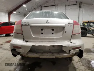 2012 Suzuki SX4 LE with VIN JS2YC5A38C6302014, listed as a Copart auction lot 47006645 with 176,113 mi miles and Salvage Title. Bid and sale history available at DreamBid. Image 6.
