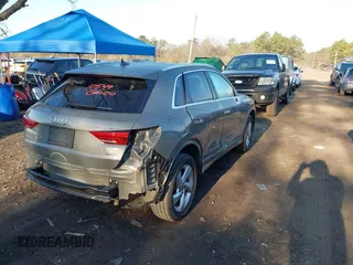 2021 Audi Q3 Premium with VIN WA1AUCF34M1099668, listed as a IAAI auction lot 41990226 with 69,866 mi miles and . Bid and sale history available at DreamBid. Image 4.