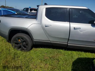 2023 Rivian R1T Adventure with VIN 7FCTGAAA2PN019226, listed as a Copart auction lot 75383334 with 11,737 mi miles and Non Repairable. Bid and sale history available at carsss.com. Image 3.