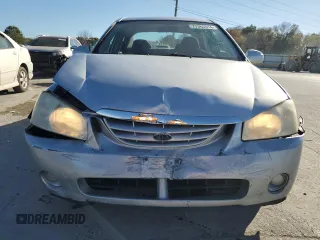 2006 Kia Spectra EX with VIN KNAFE121965372856, listed as a Copart auction lot 77365514 with 316,947 mi miles and Clean Title. Bid and sale history available at carsss.com. Image 5.