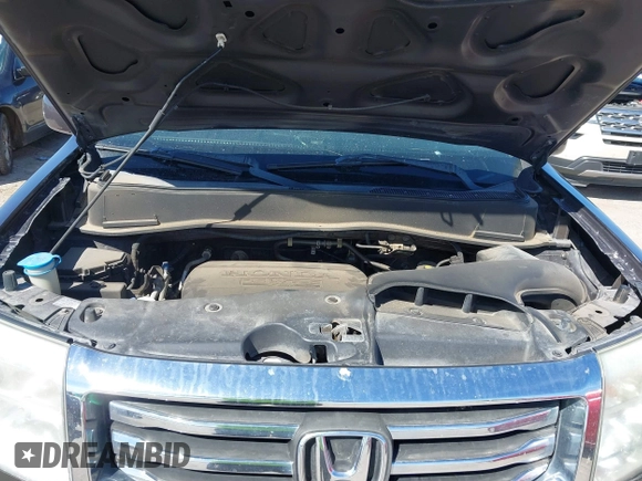 2012 Honda Pilot Touring with VIN 5FNYF4H99CB069996, listed as a IAAI auction lot 41809046 with 140,836 mi miles and . Bid and sale history available at DreamBid. Image 10.