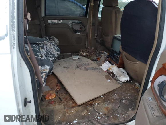 1995 GMC Suburban z VIN 1GKFK16K3SJ704911, wystawiony jako Copart lot #88326825 z przebiegiem 191 006 mil mil oraz Szkoda całkowita • Salvage title. Historia ofert i sprzedaży dostępna na DreamBid. Obrazek 11.