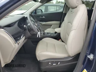 2021 Cadillac XT4 FWD Premium Luxury z VIN 1GYFZCR48MF056210, wystawiony jako Copart lot #45818245 z przebiegiem Nie podano mil oraz Nie do naprawy • Non repairable. Historia ofert i sprzedaży dostępna na DreamBid. Obrazek 7.