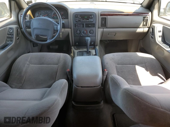 2000 Jeep Grand Cherokee Laredo with VIN 1J4G248S6YC333068, listed as a Copart auction lot 54972765 with 183,775 mi miles and Clean title. Bid and sale history available at DreamBid. Image 8.