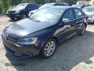 2013 Volkswagen Jetta SE z VIN 3VWDP7AJ5DM432371, wystawiony jako IAAI lot #42607003 z przebiegiem 172 077 mil mil oraz . Historia ofert i sprzedaży dostępna na DreamBid. Obrazek 2.
