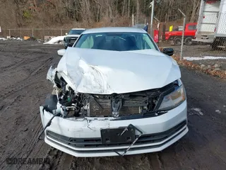 2017 Volkswagen Jetta 1.4T S with VIN 3VW167AJ9HM215563, listed as a IAAI auction lot 41473283 with 119,648 mi miles. Bid and sale history available at carsss.com. Image 12.