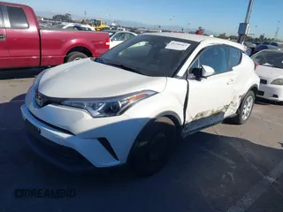 2019 Toyota C-HR XLE with VIN JTNKHMBX4K1058916, listed as a IAAI auction lot 41296963 with 113,290 mi miles. Bid and sale history available at carsss.com. Image 17.