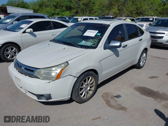 2010 Ford Focus SEL with VIN 1FAHP3HN2AW230823, listed as a IAAI auction lot 41982663 with 138,427 mi miles. Bid and sale history available at carsss.com. Image 2.