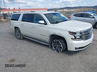 2015 Chevrolet Suburban LTZ with VIN 1GNSKKKC4FR304532, listed as a IAAI auction lot 41899860 with 123,624 mi miles. Bid and sale history available at carsss.com. Image 1.