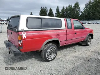 1989 Nissan Hardbody E z VIN 1N6ND16Y9KC352795, wystawiony jako Copart lot #72202814 z przebiegiem 242 396 mil mil oraz Tytuł czysty. Historia ofert i sprzedaży dostępna na DreamBid. Obrazek 3.
