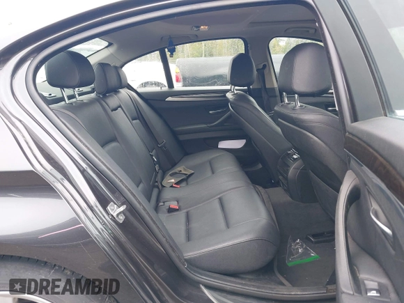 2015 BMW 5 Series 528i xDrive with VIN WBA5A7C59FG142685, listed as a IAAI auction lot 42181388 with 124,482 mi miles and . Bid and sale history available at DreamBid. Image 8.