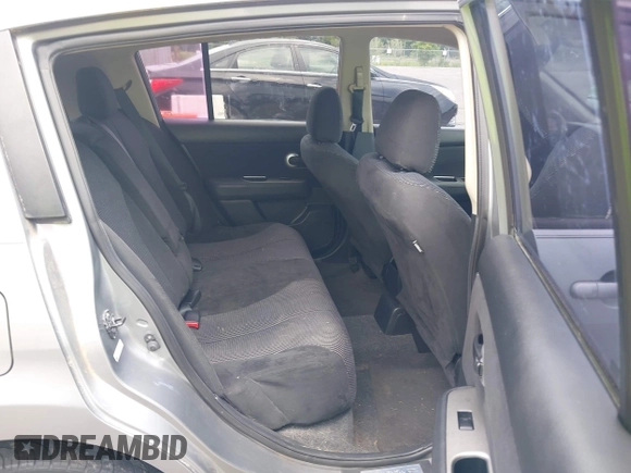 2012 Nissan Versa S with VIN 3N1BC1CP9CK239898, listed as a IAAI auction lot 42210704 with 97,714 mi miles and . Bid and sale history available at DreamBid. Image 8.