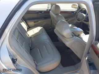 2001 Cadillac DeVille with VIN 1G6KD54Y91U235374, listed as a IAAI auction lot 41874980 with 136,090 mi miles. Bid and sale history available at carsss.com. Image 8.
