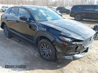 2022 Mazda CX-30 S with VIN 3MVDMBALXNM402265, listed as a IAAI auction lot 41458605 with 76,291 mi miles and . Bid and sale history available at carsss.com. Image 1.