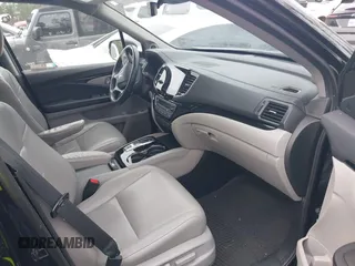 2019 Honda Pilot Touring 7-Passenger z VIN 5FNYF5H66KB027960, wystawiony jako IAAI lot #41863212 z przebiegiem 114 615 mil mil oraz . Historia ofert i sprzedaży dostępna na DreamBid. Obrazek 5.