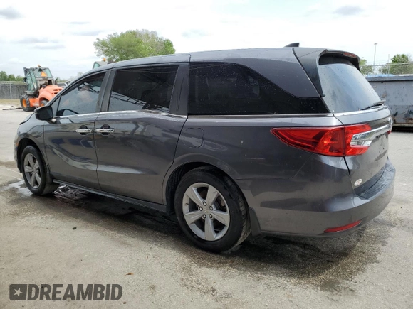 2019 Honda Odyssey EX-L with VIN 5FNRL6H75KB004911, listed as a Copart auction lot 48954335 with 74,720 mi miles and Clean Title. Bid and sale history available at carsss.com. Image 2.
