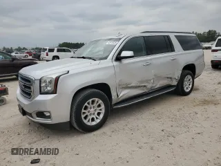2019 GMC Yukon XL SLT with VIN 1GKS1GKC9KR288660, listed as a Copart auction lot 53510325 with 77,485 mi miles and Salvage Title. Bid and sale history available at carsss.com. Image 1.