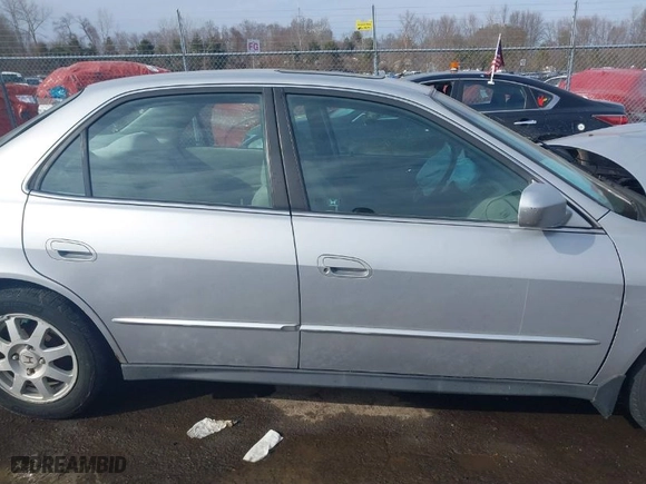 2002 Honda Accord Sdn SE with VIN 1HGCG66802A104348, listed as a IAAI auction lot 41663277 with 122,147 mi miles. Bid and sale history available at carsss.com. Image 14.
