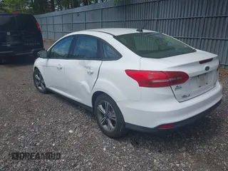 2017 Ford Focus SE with VIN 1FADP3FEXHL233966, listed as a IAAI auction lot 42220832 with 70,197 mi miles and . Bid and sale history available at carsss.com. Image 3.