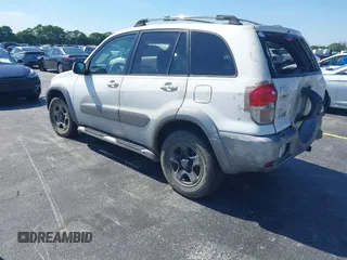 2003 Toyota RAV4 with VIN JTEGH20V030088837, listed as a IAAI auction lot 42025704 with 159,746 mi miles. Bid and sale history available at carsss.com. Image 3.