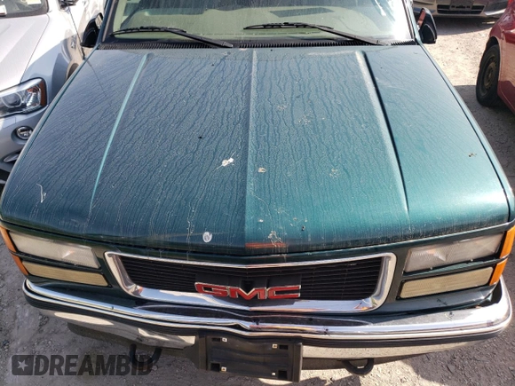 1998 GMC Yukon with VIN 1GKEK13RXWJ723572, listed as a Copart auction lot 65987314 with 237,503 mi miles and Salvage Title. Bid and sale history available at carsss.com. Image 12.