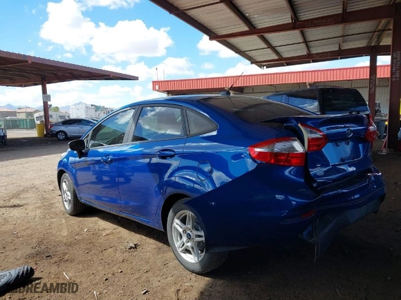 2018 Ford Fiesta SE with VIN 3FADP4BJXJM147053, listed as a IAAI auction lot 41711407 with 69,227 mi miles. Bid and sale history available at carsss.com. Image 3.