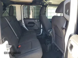2023 Jeep Wrangler Sport S with VIN 1C4HJXDG3PW522449, listed as a Copart auction lot 41622185 with 25,436 mi miles and Salvage Title. Bid and sale history available at DreamBid. Image 11.
