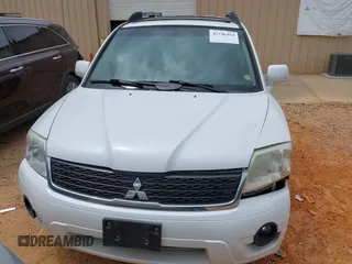 2011 Mitsubishi Endeavor z VIN 4A4JM3AS2BE037110, wystawiony jako IAAI lot #42106914 z przebiegiem 160 327 mil mil oraz . Historia ofert i sprzedaży dostępna na DreamBid. Obrazek 12.