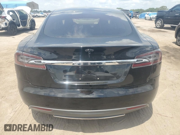2014 Tesla Model S 60 with VIN 5YJSA1S16EFP50982, listed as a Copart auction lot 54426015 with 76,515 mi miles and Salvage title. Bid and sale history available at DreamBid. Image 6.