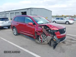 2020 Cadillac XT6 AWD Sport z VIN 1GYKPHRS1LZ201472, wystawiony jako IAAI lot #40610438 z przebiegiem 71 540 mil mil oraz . Historia ofert i sprzedaży dostępna na DreamBid. Obrazek 6.