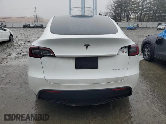 2023 Tesla Model Y Long Range z VIN 7SAYGDEE1PA114563, wystawiony jako Copart lot #44423505 z przebiegiem Nie podano mil oraz Szkody całkowita. Historia ofert i sprzedaży dostępna na DreamBid. Obrazek 6.