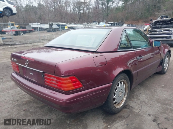 1997 Mercedes-Benz SL-Class with VIN WDBFA67F3VF142320, listed as a IAAI auction lot 41835593 with 172,151 mi miles. Bid and sale history available at carsss.com. Image 4.