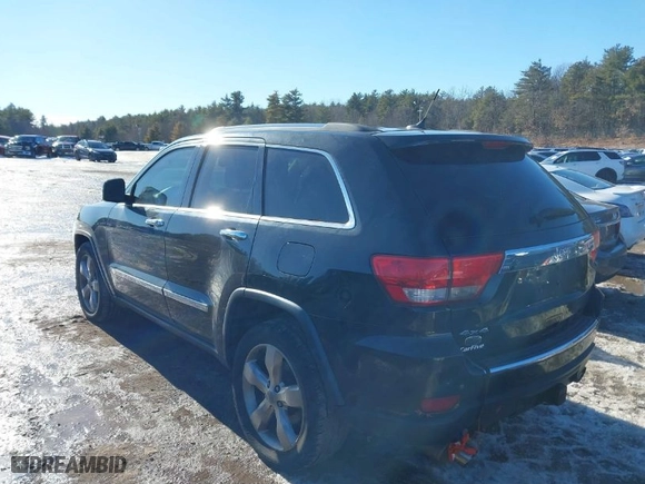 2013 Jeep Grand Cherokee Overland Summit with VIN 1C4RJFCTXDC655266, listed as a IAAI auction lot 41513062 with NaN miles. Bid and sale history available at carsss.com. Image 3.