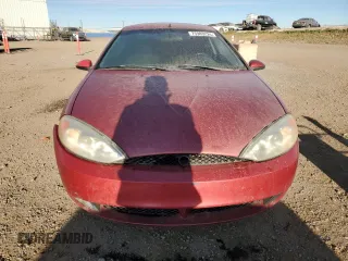 2001 Mercury Cougar z VIN 1ZWFT61L415605536, wystawiony jako Copart lot #75903224 z przebiegiem 337 790 mil mil oraz Tytuł czysty. Historia ofert i sprzedaży dostępna na DreamBid. Obrazek 5.