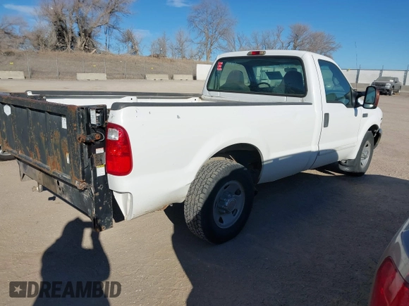 2002 Ford Super Duty F-250 XL with VIN 1FTNF20L12EB69721, listed as a IAAI auction lot 41324860 with 232,751 mi miles. Bid and sale history available at carsss.com. Image 4.