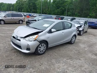 2014 Toyota Prius One with VIN JTDKDTB34E1562443, listed as a IAAI auction lot 42110012 with 144,120 mi miles and . Bid and sale history available at DreamBid. Image 2.