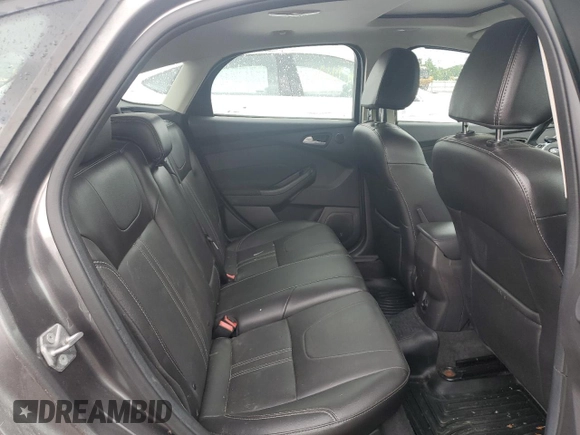 2014 Ford Focus Titanium with VIN 1FADP3N20EL329415, listed as a Copart auction lot 60881115 with 97,382 mi miles and Salvage title. Bid and sale history available at DreamBid. Image 10.
