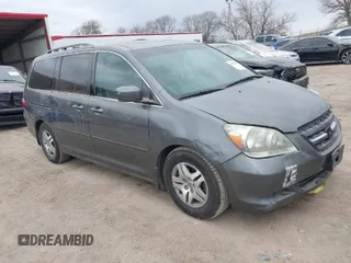 2007 Honda Odyssey EX-L with VIN 5FNRL386X7B423012, listed as a IAAI auction lot 41876854 with 266,588 mi miles. Bid and sale history available at carsss.com. Image 1.