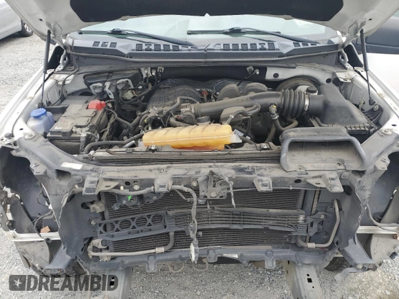 2018 Ford F-150 XL with VIN 1FTMF1CB5JKE71859, listed as a Copart auction lot 59614905 with 112,757 mi miles and Salvage title. Bid and sale history available at DreamBid. Image 11.