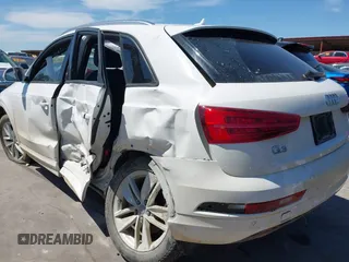 2017 Audi Q3 Premium z VIN WA1BCCFS3HR010582, wystawiony jako IAAI lot #42234517 z przebiegiem 85 880 mil mil oraz . Historia ofert i sprzedaży dostępna na DreamBid. Obrazek 3.