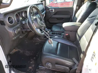 2021 Jeep Wrangler Unlimited Sahara with VIN 1C4JJXP64MW762819, listed as a Copart auction lot 49796845 with 76,543 mi miles and Salvage Title. Bid and sale history available at DreamBid. Image 7.